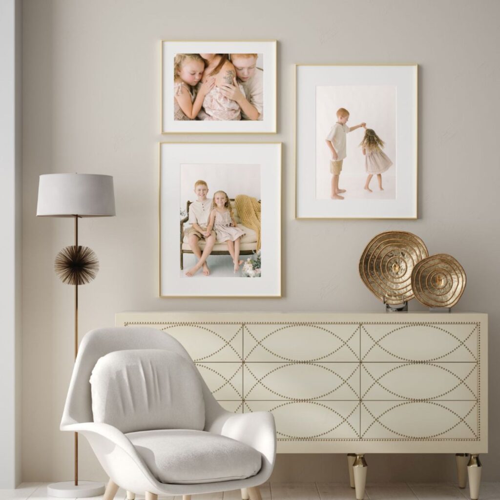 Living room photo gallery wall ideas featuring framed family portraits and custom wall art from Lindsey Lambert Photography.